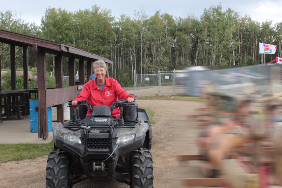  Field supervisor for Lac La Biche's World 3D Archery Championships, Ann Neumeyer checks out the relocated animal targets that have somehow magically become blurred in this photo ... phew, nobody wants the athletes to get advance notice of all the cool targets.