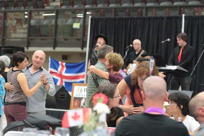  Local entertainment, like local performers 2 Euros and a Loonie were part of the weeks entertainment for athletes at the Bold Center.