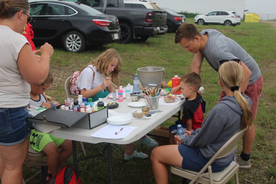 There was a paint and drawing table for kids to enjoy.