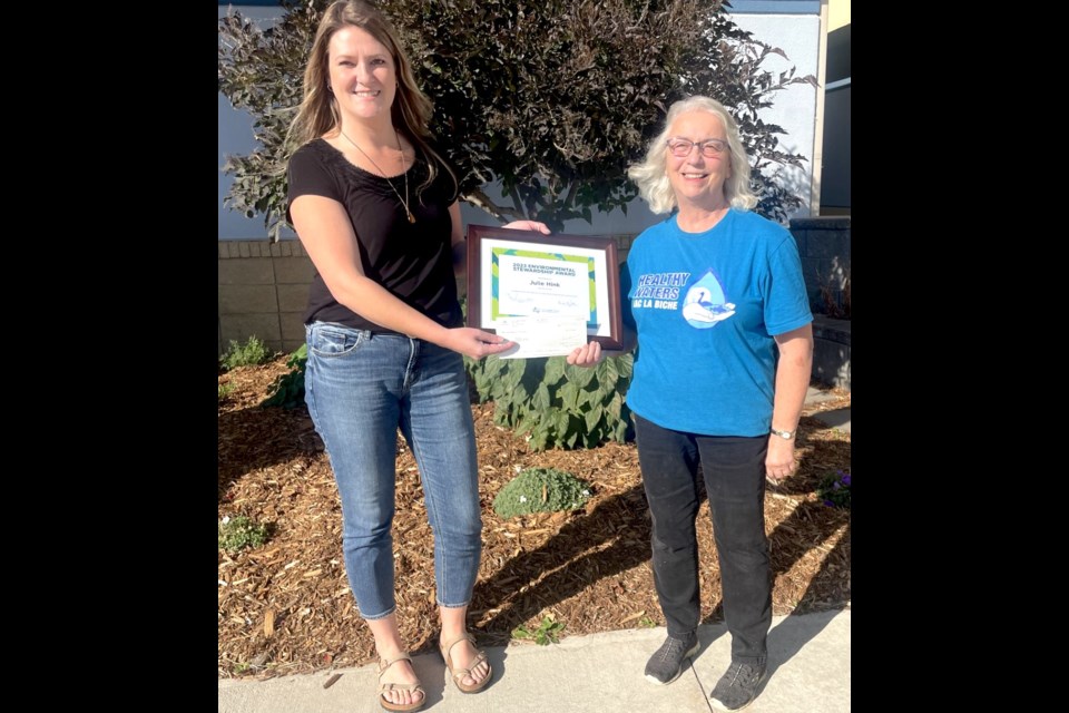 Julie Hink, left, winner of the 2023 Environmental Stewardship Award for her work with Healthy Waters Lac La Biche. Hink is being presented the award by
Randi Dupras with Lac La Biche County. Submitted photo. 