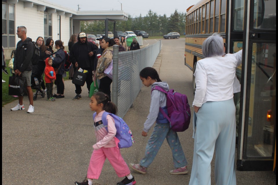 Kim Nashim, principal of Vera M. Welsh Elementary School in Lac La Biche, was busy greeting students as they departing busses for the first day of the 2025-2026 school year. Chris McGarry photo.