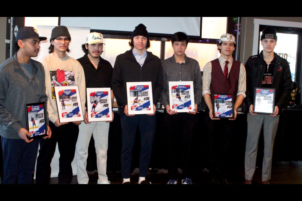 Lac La Biche Lakers’ teammates (left) Braxton Patenaude, Lac La Biche County Player of the Year; Larry Flett, Coaches Choice award; Braden Swampy, Most Valuable Player; Jero Rossi, Top Defensive Player of the Year; Payton Moneyas, Points Leader of the Year; Ethan Auger, Most Dedicated Player of the Year; and Regan Anderson, Top Forward of the Year, show off their awards during a ceremony on March 22. / Chris McGarry photo