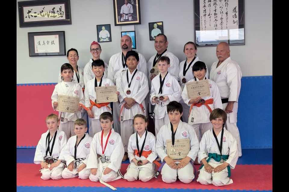 Members of Bonnyville Karate-Do stand with medals they won at the at the 2025 Shito-Ryu Karate-Do Kyokai Karate Championships, which were held in Lloydminster on April 12. Photo supplied. 