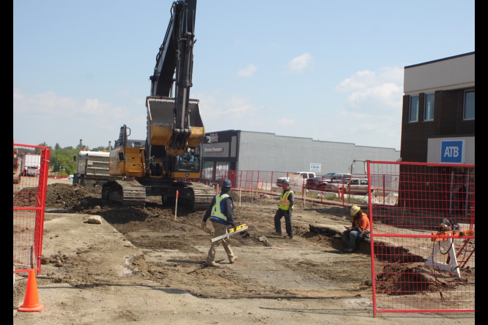 Construction work on 101 Avenue (Main Street) in Lac La Biche near the intersection with 101 Street on July 4. Chris McGarry photo. 