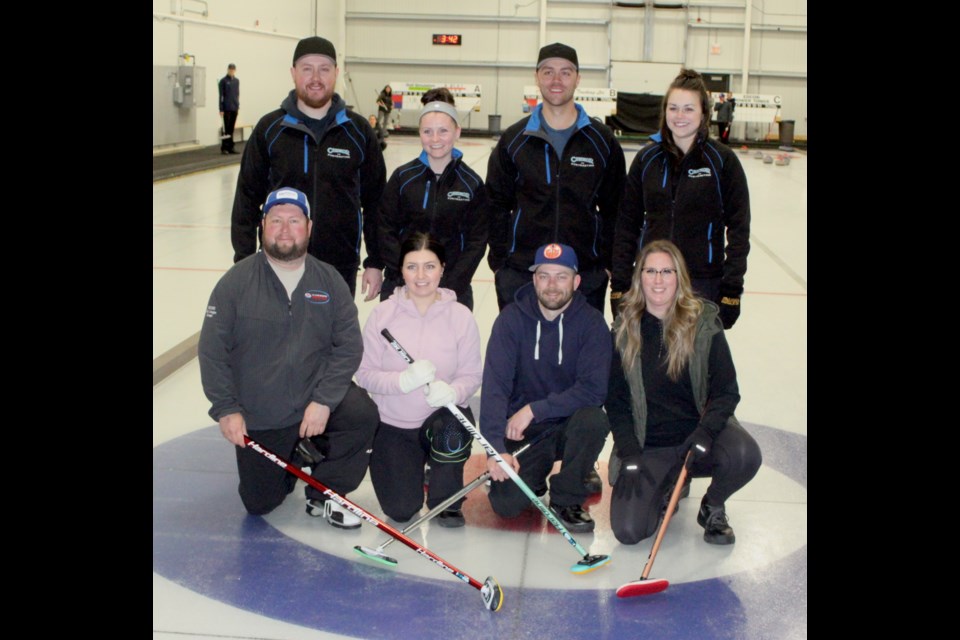 A Event winners
First place, standing: Blake Chwedoruk (skip), Megan Warawa (third), Jordan Webb (second), and Becky Chwedoruk (lead).
Second place: Kyle Beniuk (Skip), Lacey Nikipelo (third), Josh Scott (second), and Amie Beniuk (lead). Chris McGarry photo. 
