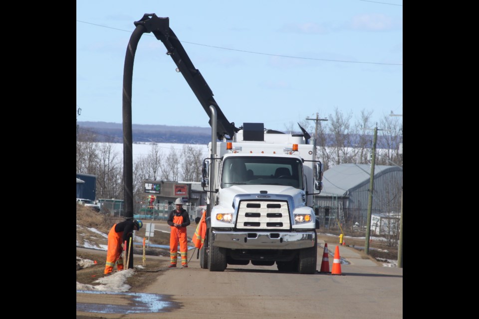 Construction crews digging holes and install fibre optics cables will be a common sight in the hamlet of Lac La Biche over the next couple of months. Fibre optics are being installed to connect most Lac La Biche County buildings and camera sites within the hamlet of Lac La Biche. Chris McGarry photo. 
