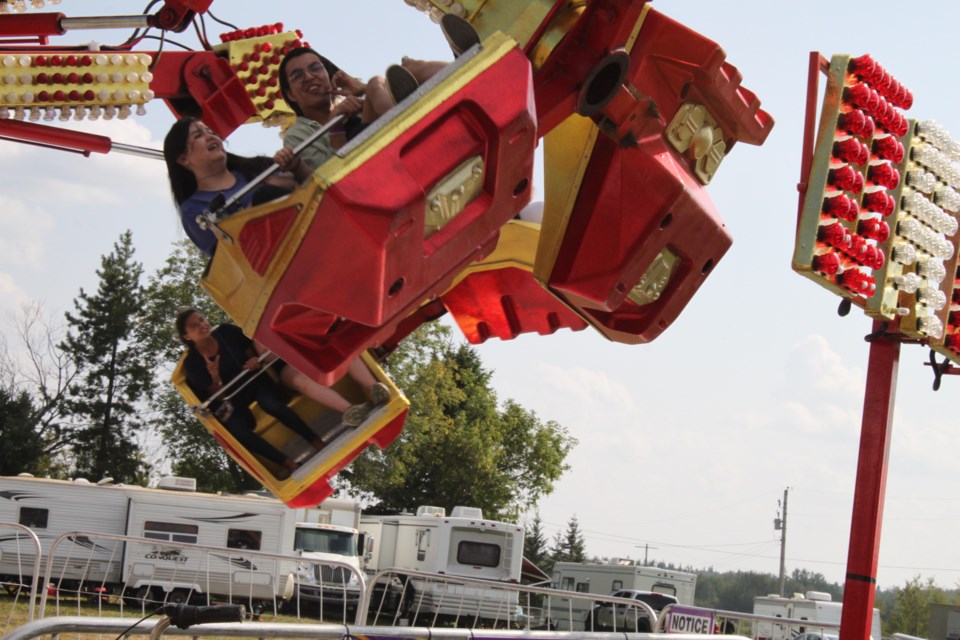 The rides were spinning and the smiles were grinning at the midway for the Lac La Biche Summer Days. Despite a move in location, the carnival drew crowds through the weekend.