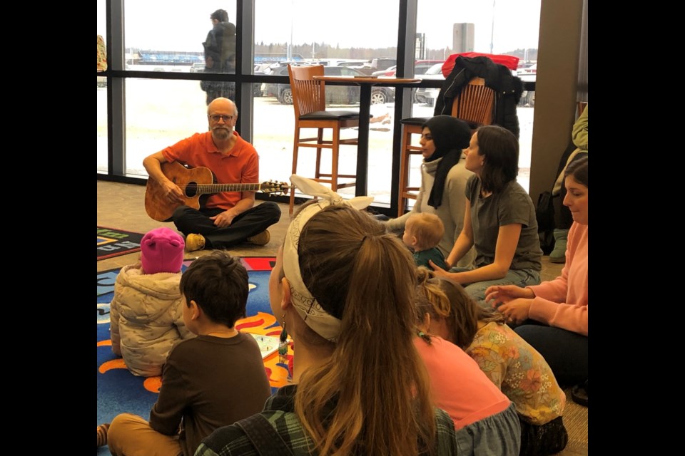 Paul Shaw performs at the Rhyme Tyme kids' program in Lac La Biche. Photo supplied. 