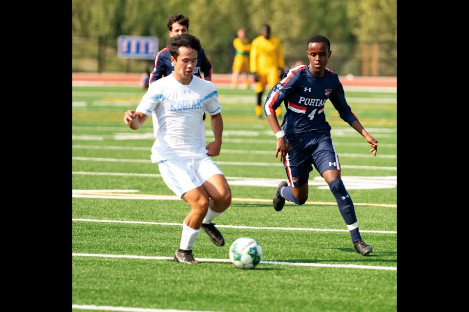 Portage College Voyageurs forward Alex Mehari, right, stays closely on a member of the Lethbridge Polytechnic Kodiaks during Saturday's exhibition match that saw the Voyageurs drop a 2-0 decision. Photo supplied. 