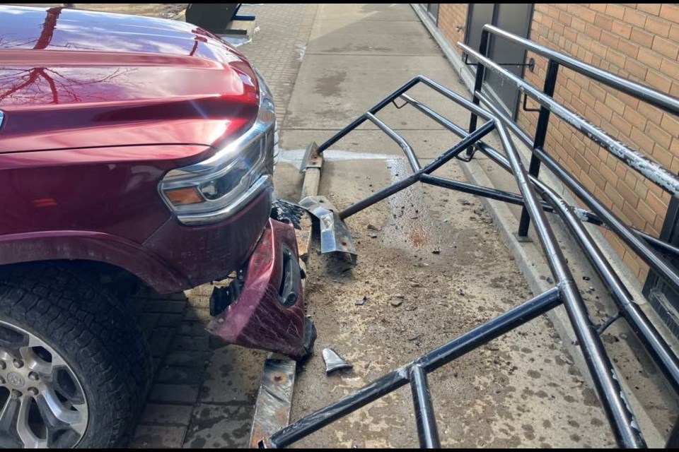 A vehicle struck the wheelchair ramp in front of the post office in Lac La Biche on April 3. / Chris McGarry photo. 