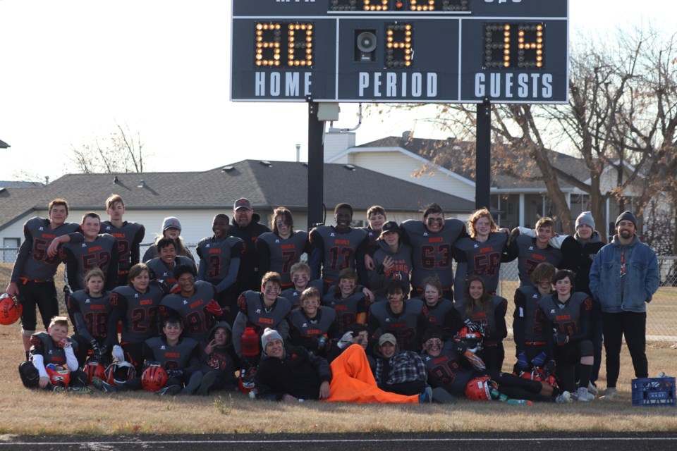 The 2022 St. Paul Bengals football team celebrates their victory.