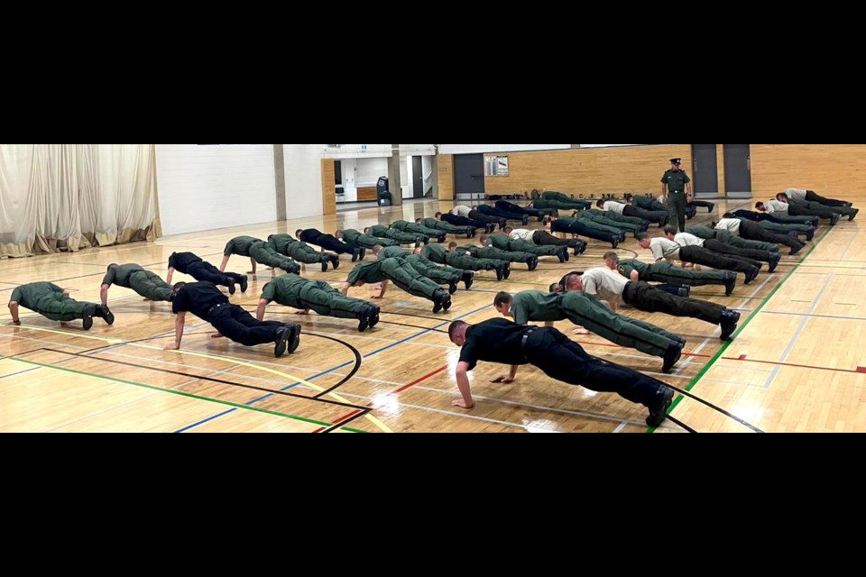 The road to becoming a conservation officer is paved with plenty of physical fitness. Here, a group of recruits in which Ryan Harnish was a part of are put through their paces during a drill session. Submitted photo.