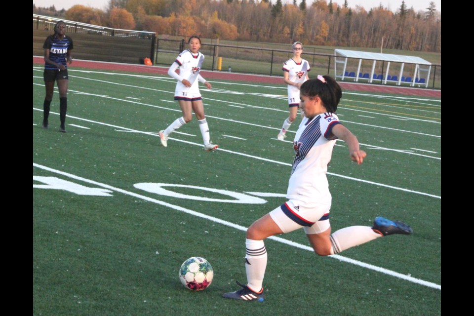 Portage College Voyageurs defence Sarah Jones clears a kick after receiving the ball from the goalkeeper during Friday’s match that saw the Voyageurs drop a 12-0 decision to the Keyano College Huskies at the Bold Centre turf. Chris McGarry photo.