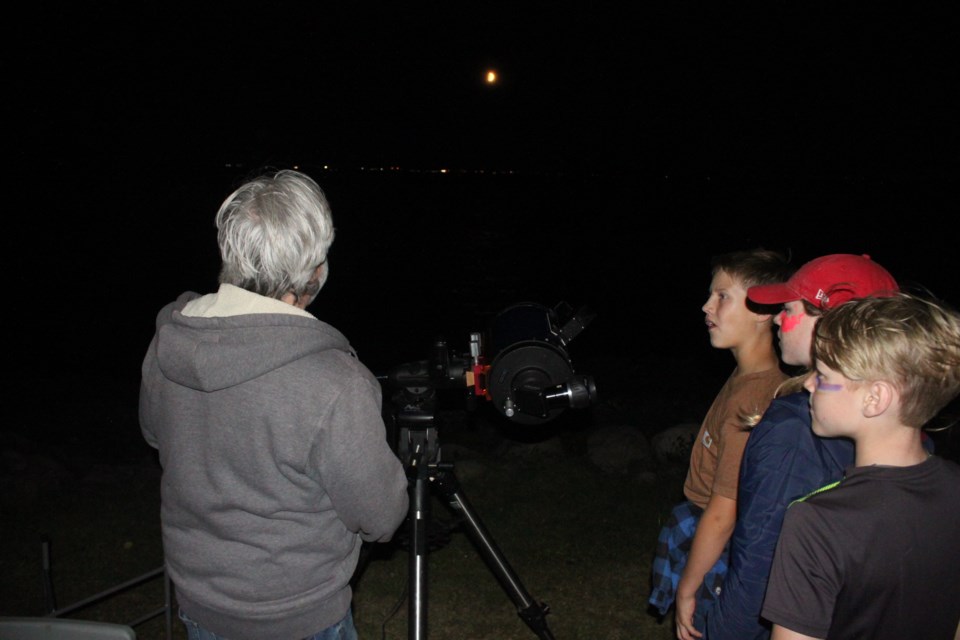 Once the guided night hike had concluded, those who had come to Sir Winston Churchill Provincial Park on Saturday, Sept. 23 for the Lakeland Dark Sky Celebration had the opportunity to study the stars and even spotted the occasional planet, which they viewed through telescopes set up by the Edmonton chapter of the Royal Astronomical Society of Canada. Chris McGarry photo. 