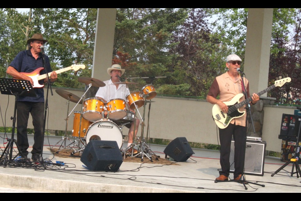 Edmonton – based hard rock trio Sweetwater, consisting of Jo McDonald (lead guitar and vocals), Don Marcotte (bass, lead vocals and harmony), and Digger Dave on Drums (drums, harmony vocals), played a number of classic rock tunes along with some of their own material. Chris McGarry photo.