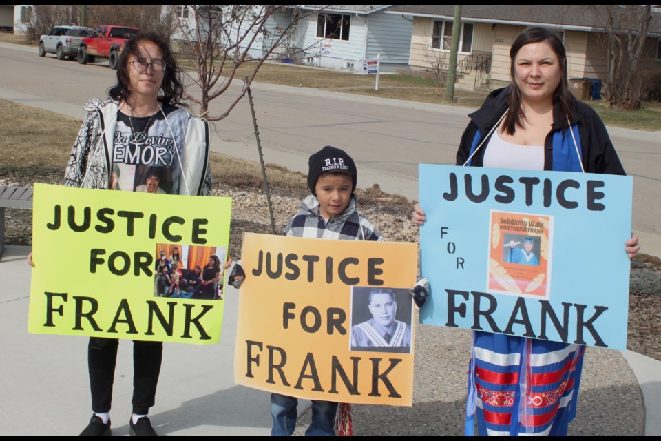Sylvia Quintal, the mother of Frank Whitford, stands with Darain Quintal and Gina Quintal at the walk of solidarity in honour of Whitford, who died while in police custody on Nov. 10, 2019. The event took place on April 12, and participants walked from the Richard and Devonian Park on 101 Avenue in Lac La Biche to the Lac La Biche RCMP detachment. Chris McGarry photo. 