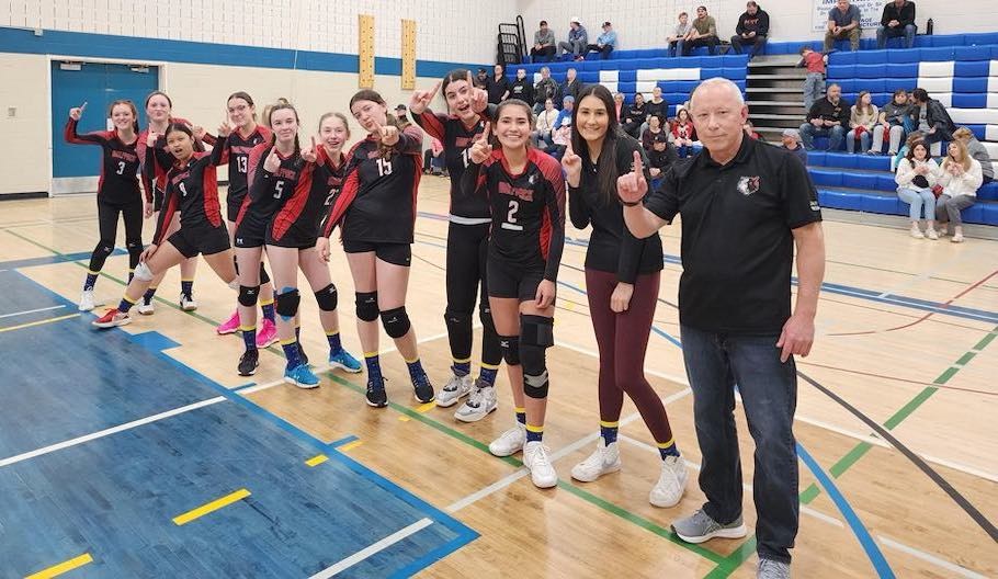 Doug Webster and the members of the Plamondon Volleyball Club (PVC) Wolfpack U14 girls team celebrating after their win in the final and lining up to receive gold medals during the provincials, which took place in Red Deer from April 20-21. 