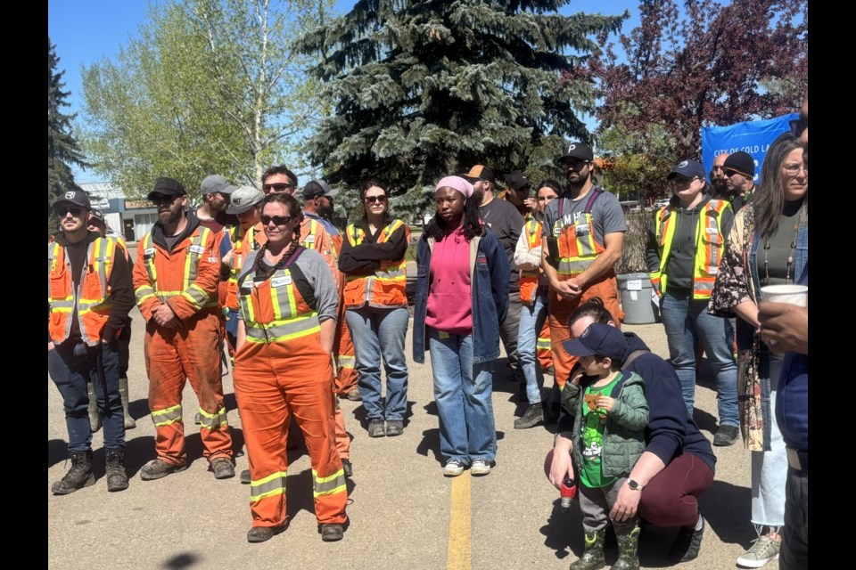 Public Works workers for the City gathered around to hear the speech and celebrate.