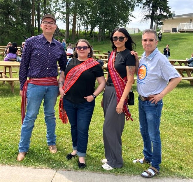 Wyatt White, a district councillor for the Métis Nation of Alberta (MNA) Otipemisiwak government, Chantel Sparklingeyes, the captain for MNA district 19, Métis District 19 councillor Danielle Lynis, and Robert Rayko, the cultural and community facilitator for Portage College, at the National Indigenous People’s Day event, which took place at Lac La Biche’s McArthur Park on June 20. Chris McGarry photo. 