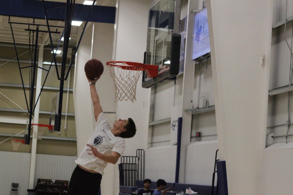 Zander Kruk goes up for a layup at the Bold Center courts.