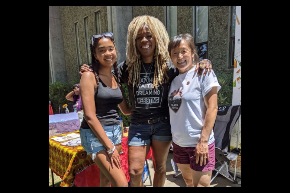 Faith Alpher (center) poses with her daughter Whitley and Livermore Board of Education trustee Kristie Wang during the 2021 Juneteenth festival hosted by Tri-Valley for Black Lives. 