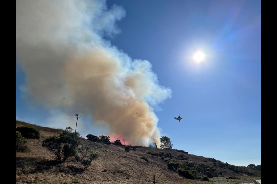 Crews battle the Eden Fire as it approaches a Dublin neighborhood. (Photo courtesy ACFD)