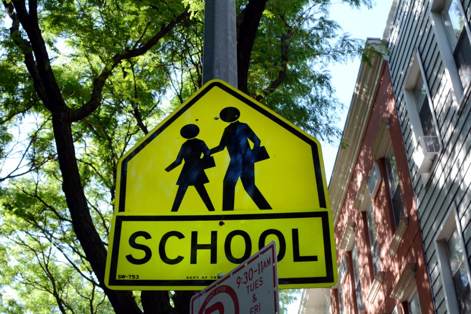 cory-seamer_school-traffic-sign_shutterstock_1420906604