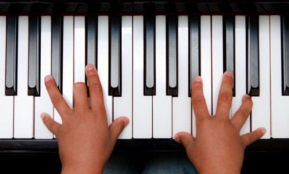 child playing piano