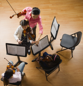 children playing violin