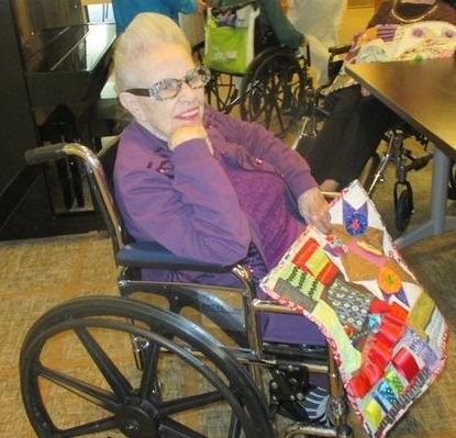 Resident with Fidget Quilt