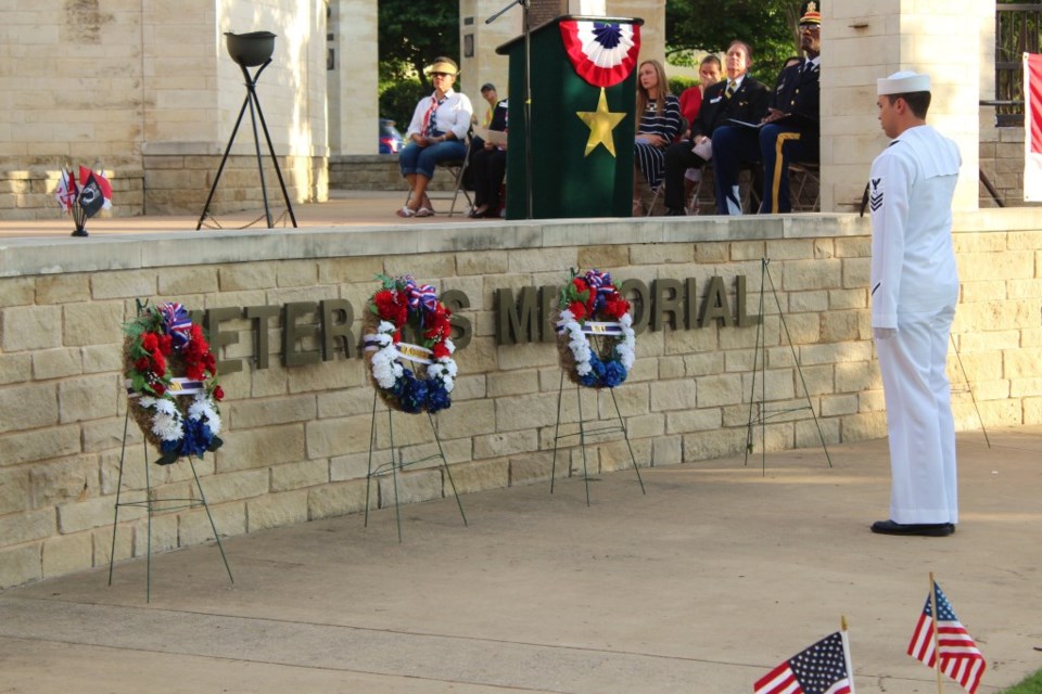 Memorial Day Plano Sunset at Memorial Park Summer ceremony honoring fallen soldiers wreath