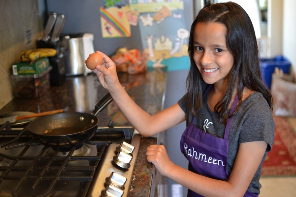 rahmeen-malik-10 child chef cooking eggs