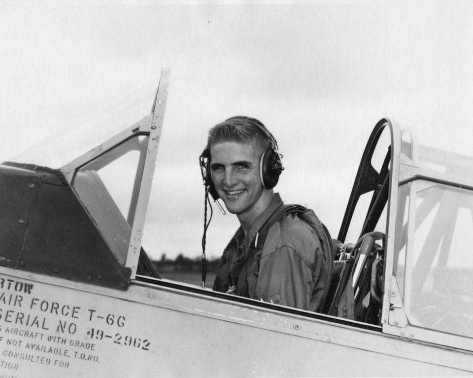 Congressman Sam Johnson sits in a T-6 Texan