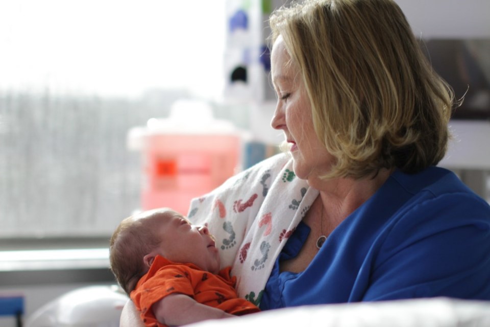 Texas Health Plano nurse Betty Harper cares for a baby in the hospital’s Neonatal Intensive Care Unit, which was designated Level IV – the state’s highest rating