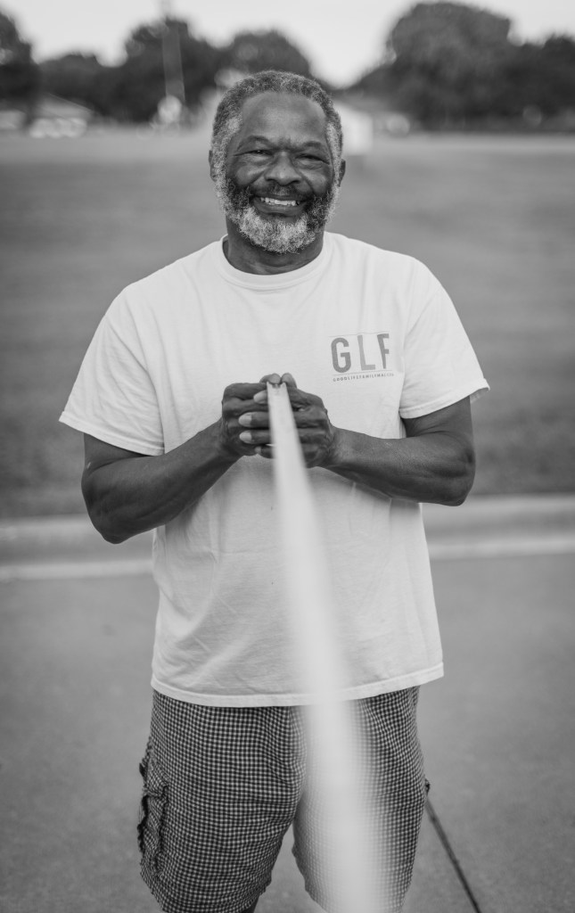 man smiles for camera