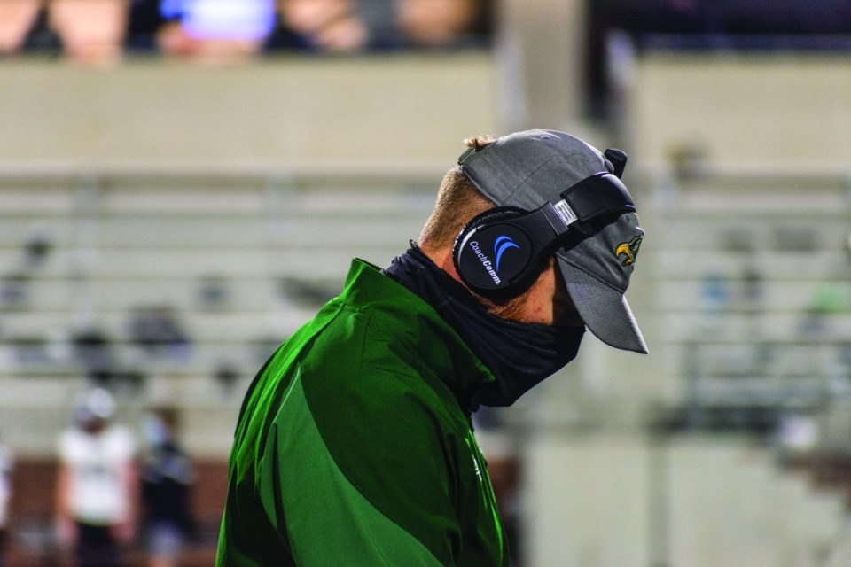 football referee wearing a mask