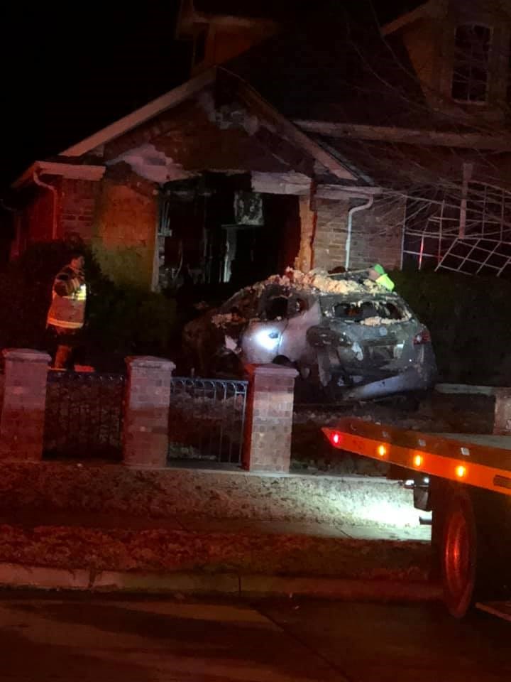 Murphy fire vs house car being towed out