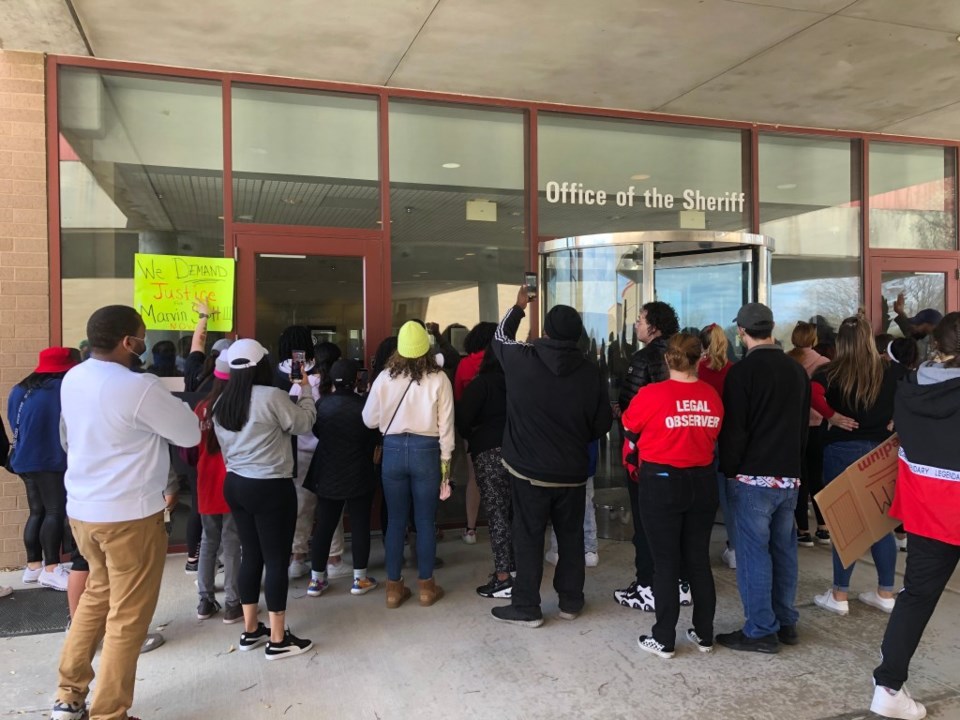 Protesters gather at Collin County jail