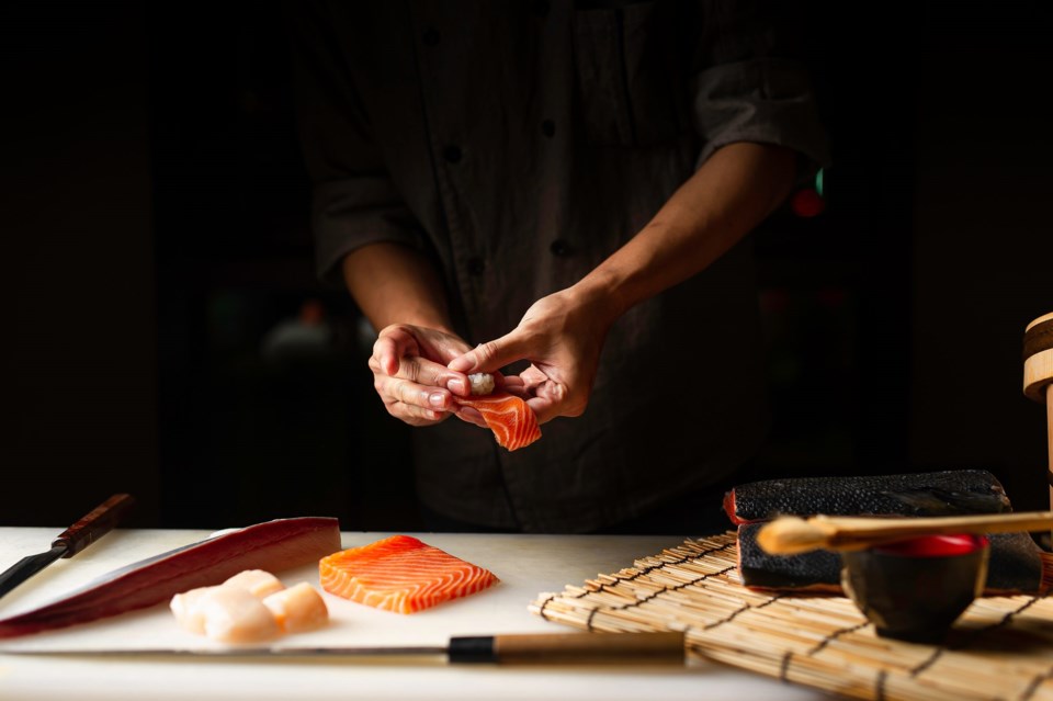 Closeup,Of,Chef,Hands,Preparing,Japanese,Food.,Japanese,Chef,Making