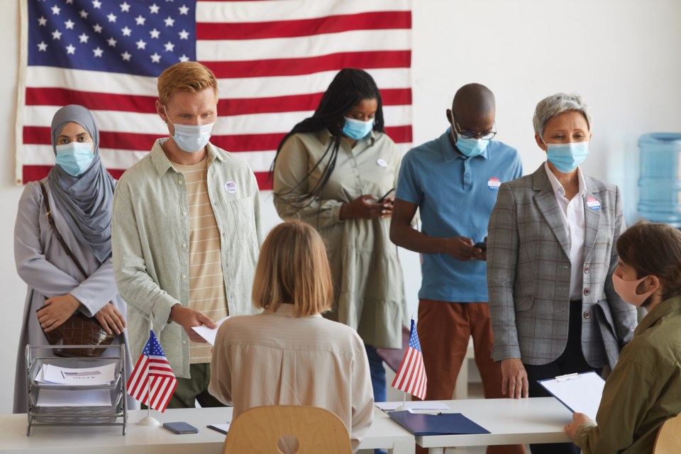 Multi-ethnic,Group,Of,People,Standing,In,Row,And,Wearing,Masks