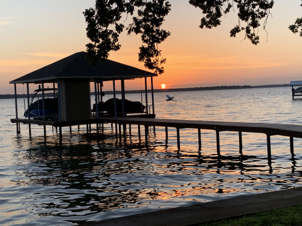 Sunsets at Texas lakes are hard to beat... like this one at Cedar Creek Lake! | Courtesy of Cedar Creek Lake’s website