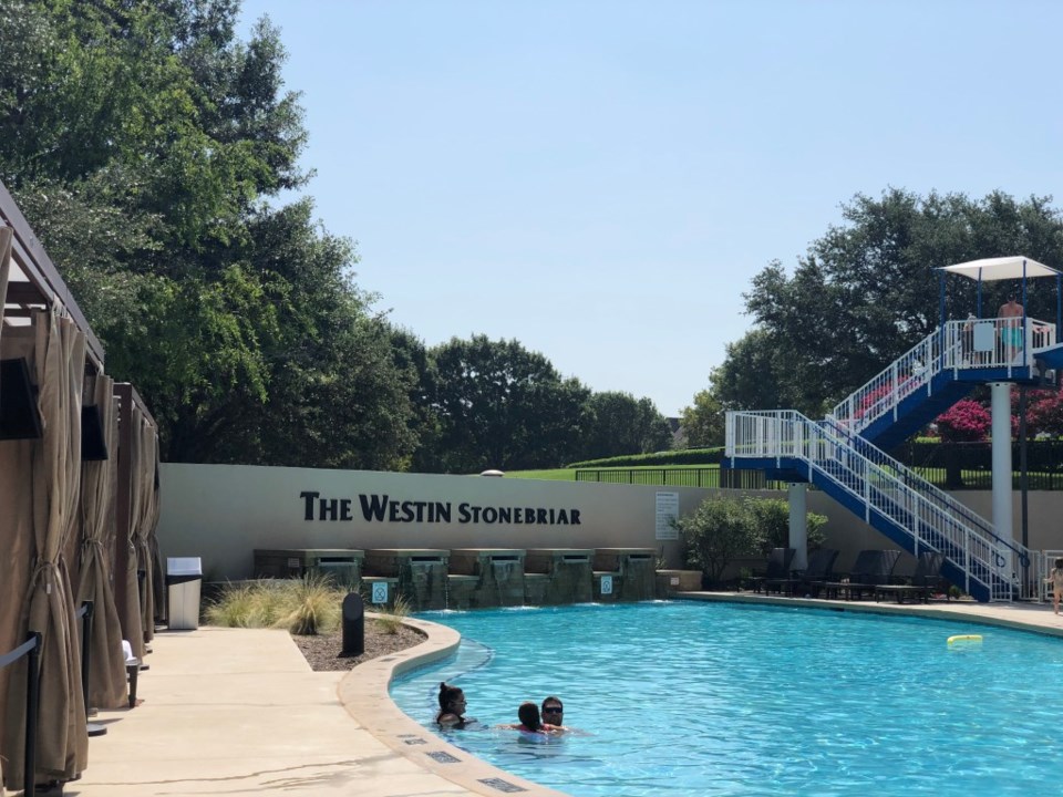 The Westin Stonebriar's pool is surrounded by comfy cabanas and has a large waterslide | Photo credit: Alex Gonzalez