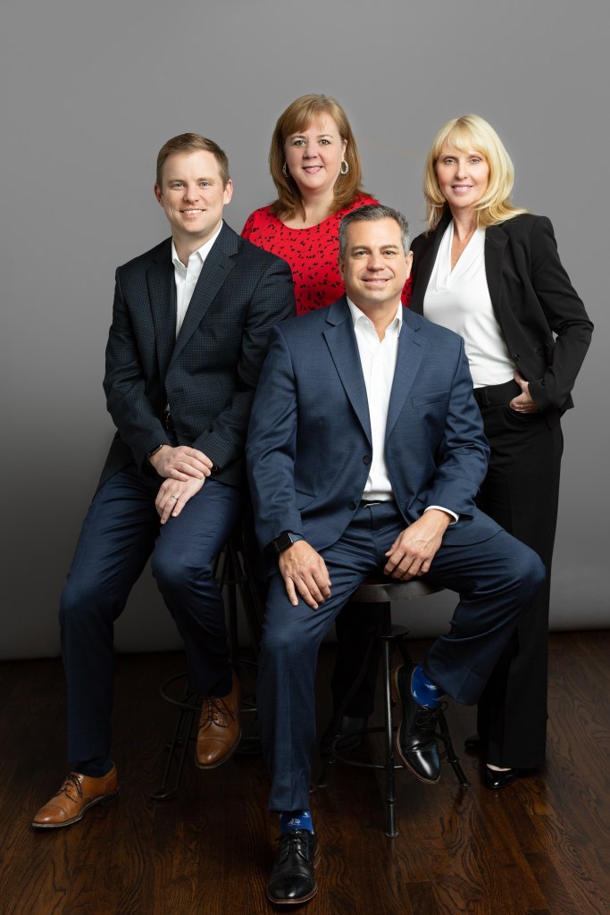 Part of the team at Astra Wealth Management Group. L to R: John Darden, Jill Tucker, Andy Evans and Candy Hawkins.  