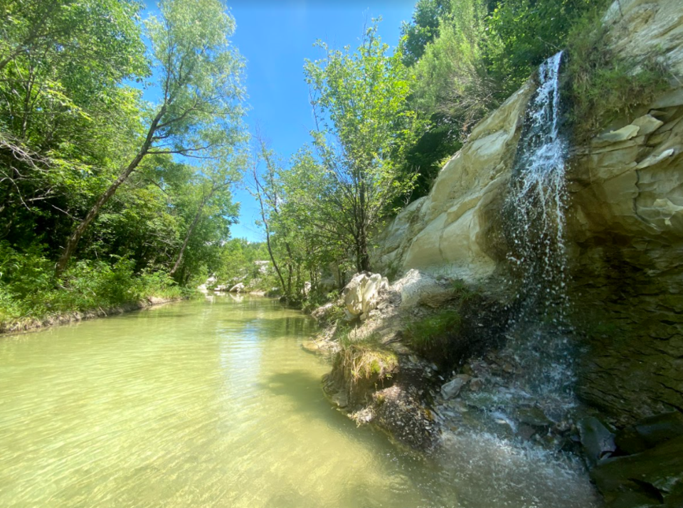 The waterfall on West Rowlett Creek at Limestone Quarry Park in Frisco