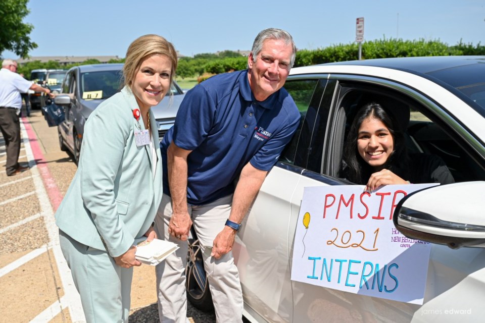 Plano Mayor John Muns pictured with one of the 80+ teens who participated in the Plano Mayor’s Summer Internship Program were celebrated during a drive-by parade