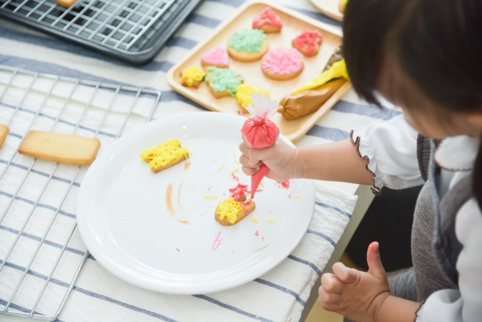 Wo doesn't love cookies? Decorating them could be a sure hit to to this weekend with your kids! | Shutterstock