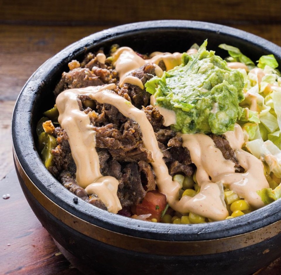 The worlds of Texas and Korea collide with the bulgogi burrito bowl | Via @madforchickenusa on Instagram