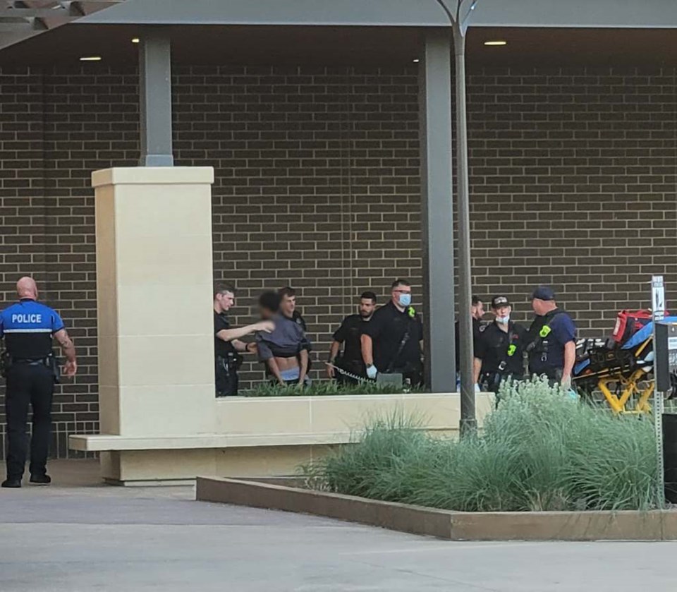 Police arresting the suspect who stabbed two people at Grandscape on August 26. The victims are in critical condition. | Jordan Jarrett