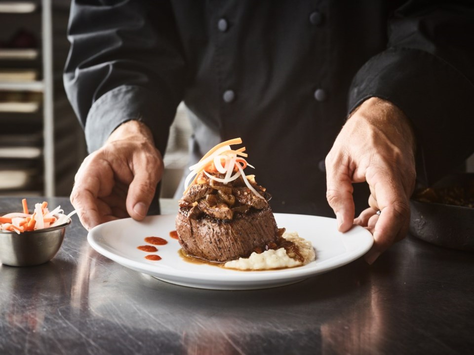 Petit filet mignon with crab-stuffed shrimp | Image courtesy of Fleming’s Prime Steakhouse and Wine Bar