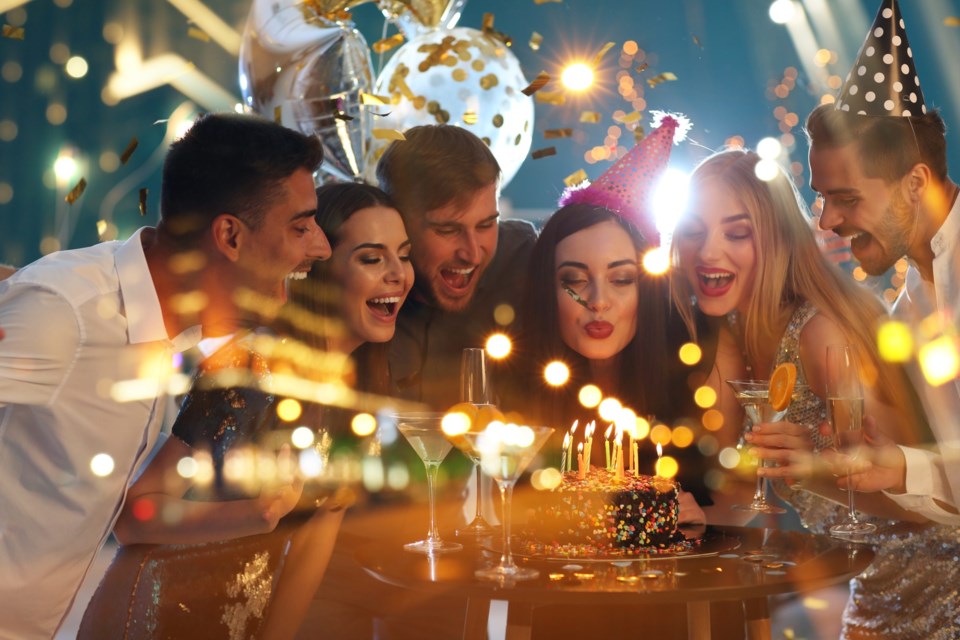 Double,Exposure,Of,Young,People,At,Birthday,Party,And,Illuminated